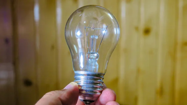 Old Incandescent Light Bulb Hand — Stock Photo, Image