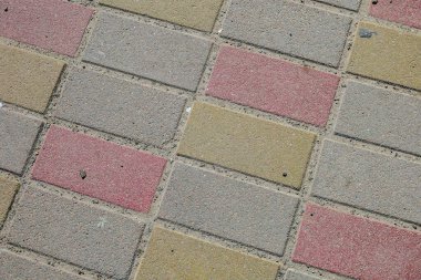 Kırmızı-gri kaldırım taşlarının dokusu