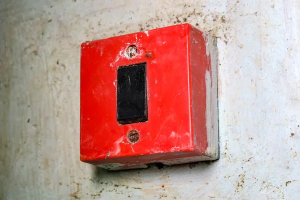 Old Red Light Switch Wall Stock Picture