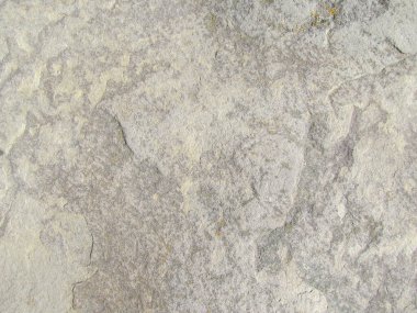 Güneşte arka planda granit taş dokusu