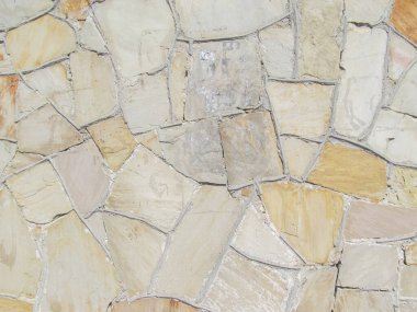 Arka plan için tapınağın yanındaki eski bir taş duvarın dokusu.