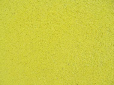 Arkaplan için sarı alçılı duvar dokusu