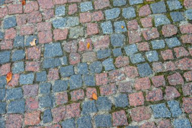 Arka planlar için sokakta renkli beton kaldırım dokusu