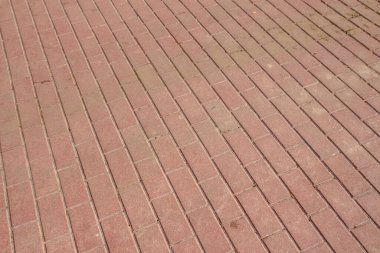 Arka planlar için sokakta renkli beton kaldırım dokusu