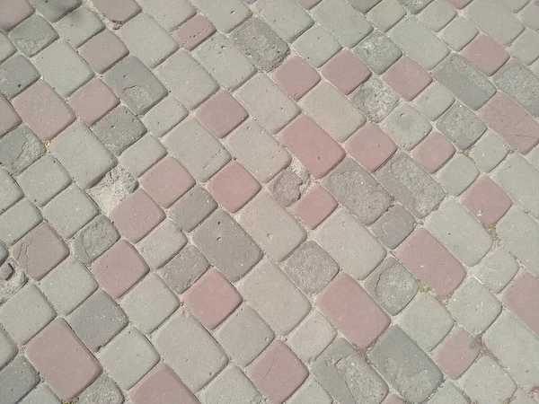 歩行者天国公園内の石畳の質感 — ストック写真