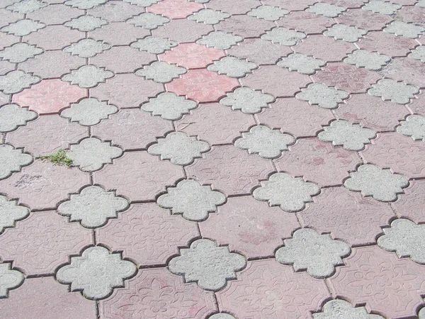 Pavement texture on the sidewalk for backgrounds