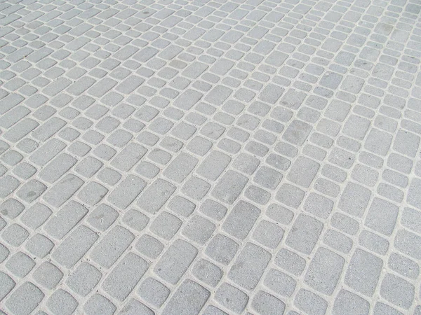 Pavement texture on the sidewalk for backgrounds