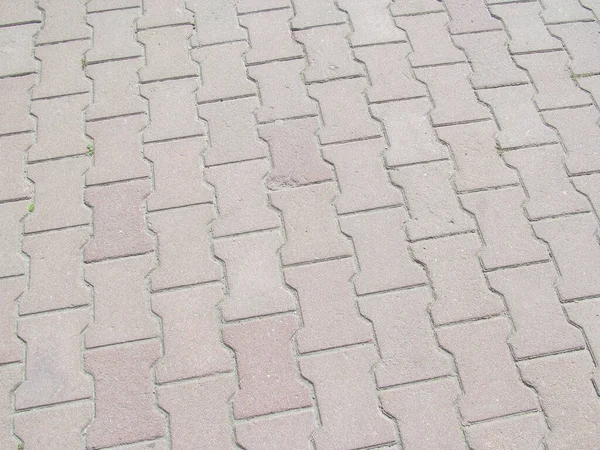 Pavement texture on the sidewalk for backgrounds