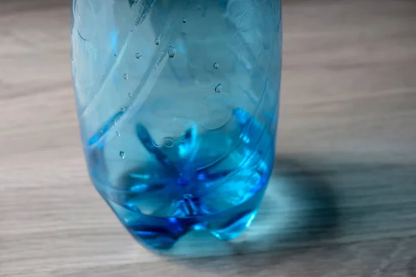 Botella Plástico Azul Con Agua Curativa —  Fotos de Stock