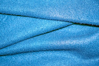 Koyu mavi katlanmış kumaş dokusu