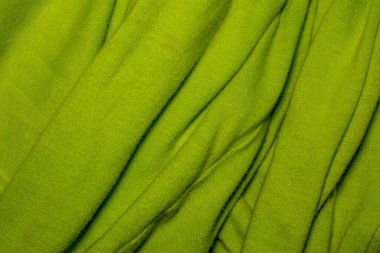 Açık yeşil ince katlanmış kumaş