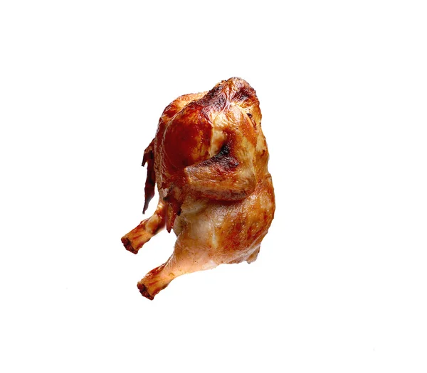 Жареная курица с корочкой на изолированном фоне — стоковое фото