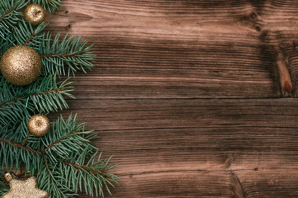 Rámeček Větví Vánočního Stromečku Zlatými Koulemi Tmavém Dřevěném Pozadí Nový — Stock fotografie