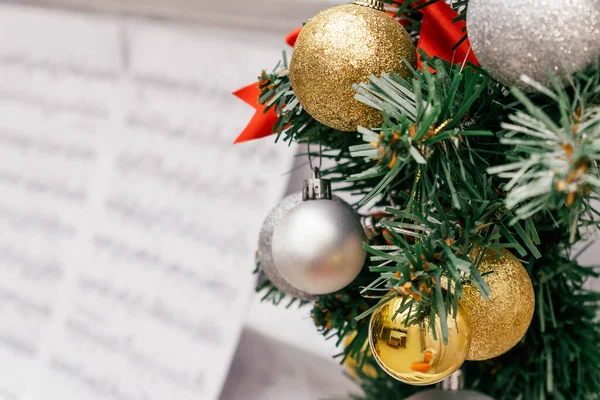 Close Composition Fir Branches Gold Silver Balls Blurred Notes Piano — Stock Photo, Image