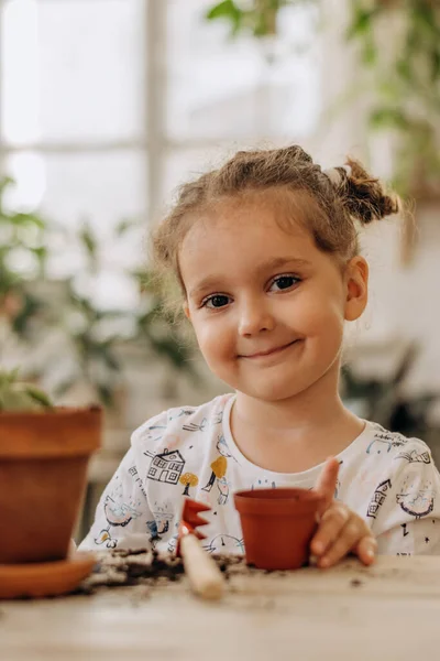 Happy Little Mixed Race Dark Haired Girl Planting Houseplants Terracotta — Stock Photo, Image