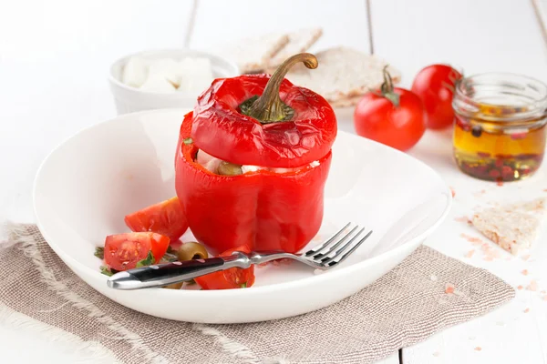 Plate with baked stuffed peppers. — Stock Photo, Image
