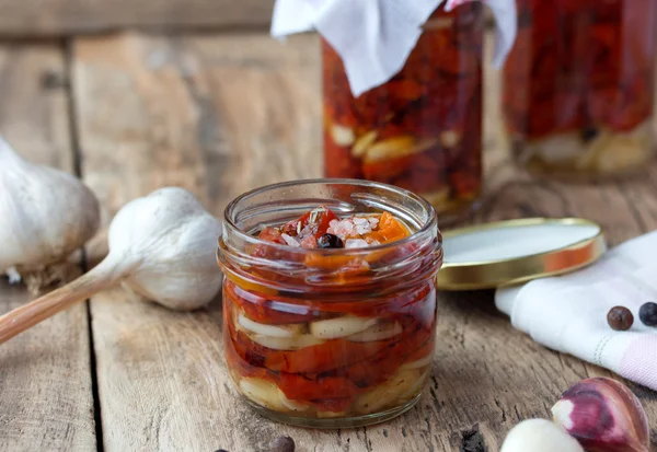 Sun dried tomatoes with olive oil in a jar — Stock Photo, Image