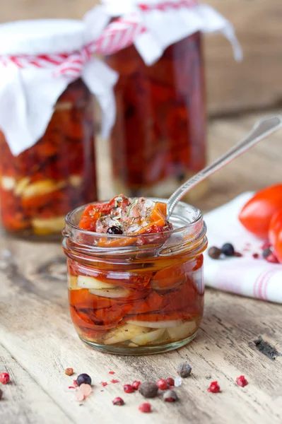 Sun dried tomatoes with olive oil in a jar — Stock Photo, Image
