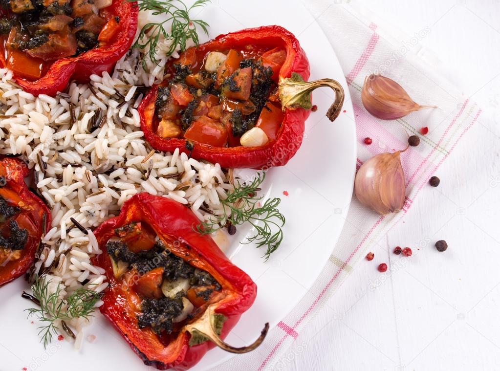 Roasted bell peppers stuffed with pesto and tomato