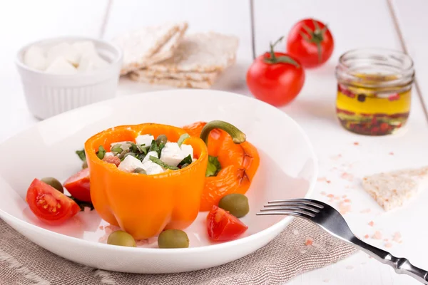 Plate with baked stuffed peppers. — Stock Photo, Image