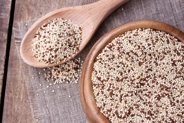 Quinoa on the wooden desk — Stock Photo, Image
