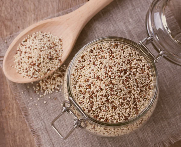 Quinoa on the wooden desk — Stock Photo, Image