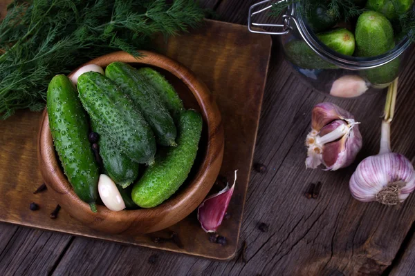 Fresh cucumbers on wooden table — Stock Photo, Image