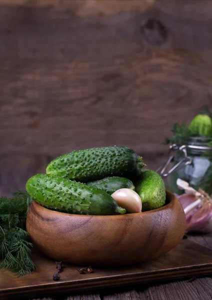 Fresh cucumbers on wooden table — Stock Photo, Image