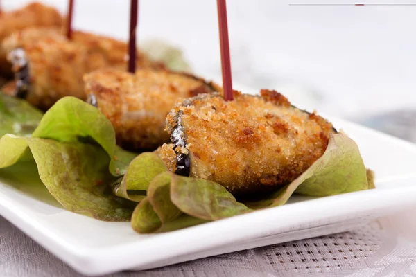 Eggplant appetizer on white plate — Stock Photo, Image