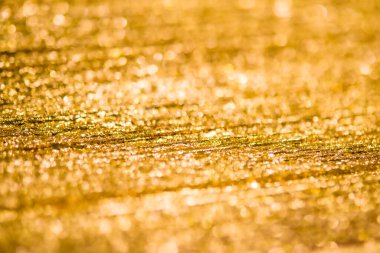 Altın sarısı desen soyut duvar arkaplanı ve gradyan gölgeleri parlak