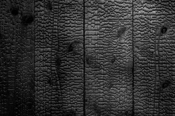 烧焦的黑色木纹的表面背景 — 图库照片