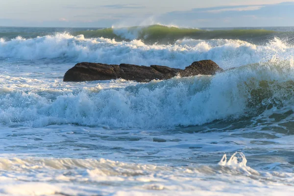 Breaking waves on an Atlantic Ocean beach in France.