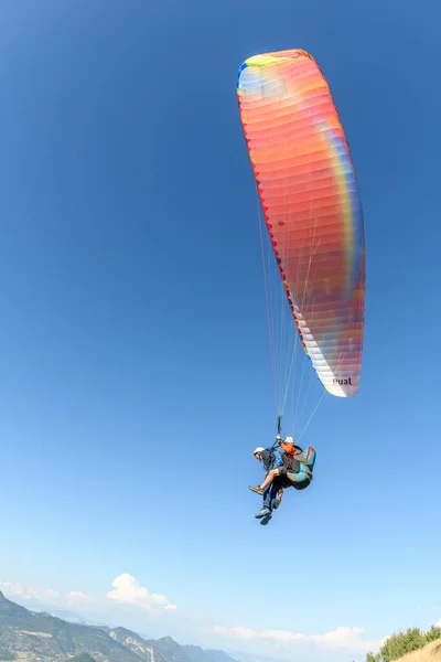 Paragliding flight in the air over the mountains. Drome, France.