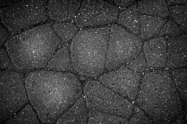 Абстрактний сірий фон з тріщини асфальту — стокове фото