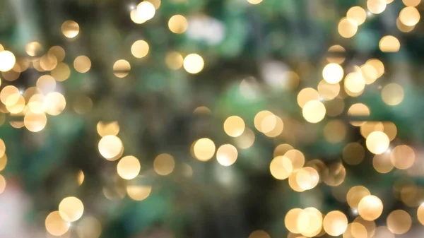 Abstract Glittering - Green Glitter With Golden Christmas Lights And Shiny sparkling Background. High quality photo