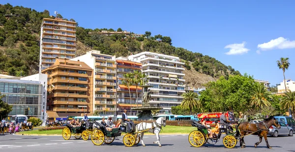 MALAGA, SPAIN - JUNE, 14: Horsemen and carriages in the city str. — стоковое фото