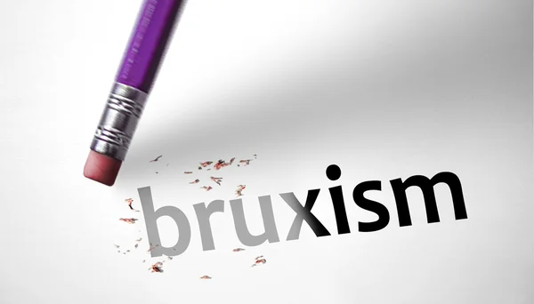 Borracha que apaga a palavra Bruxism — Fotografia de Stock