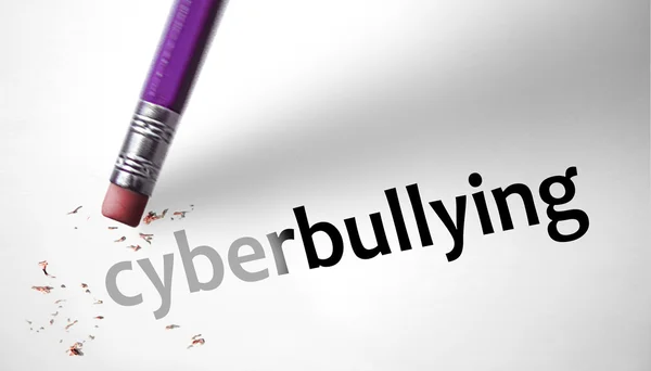 Eraser deleting the word cyberbullying — Stock Photo, Image
