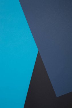 Geometrik bileşim. Siyah, mavi kağıt. Çapraz çiçekler. Klasik renkler. İş biçimi.