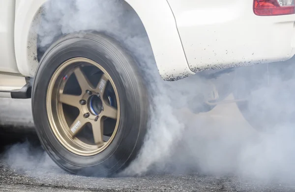 Car burnout at a drag racing track — Stock Photo, Image