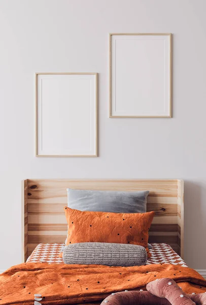 Orange wooden bedroom design, poster frame mockup, 3d render