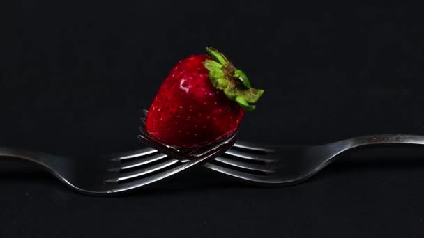 Composition with strawberry and forks — Stock Video