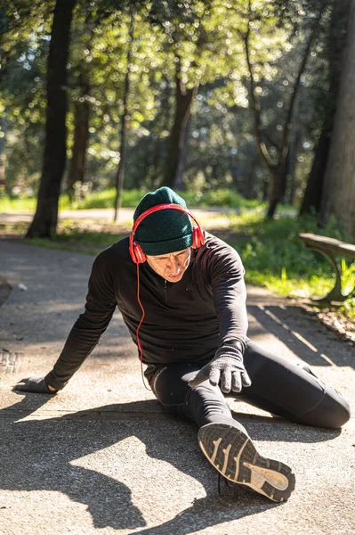 boy does physical activity in the park early in the morning