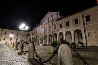 terni,italy june 30 2021:cathedral of terni seen at night illuminated by street lamps clipart