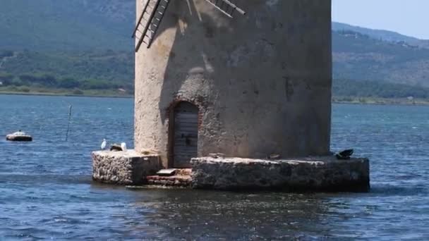 The famous mill in the sea in orbetello — Stock Video