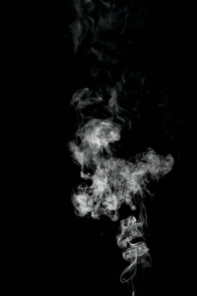Jet of smoke on a black background