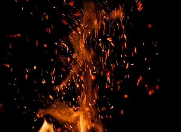 Feuerflamme Mit Funken Auf Schwarzem Hintergrund Stockbild