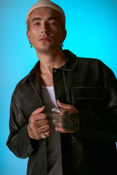 A dapper young man confidently poses in a stylish outfit with unique accessories.