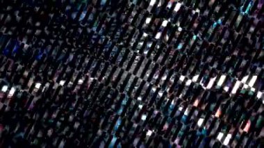 Fütürist dijital parçacıklar sürekli hareket halinde yayılan bir ışık kutusu oluştururlar.