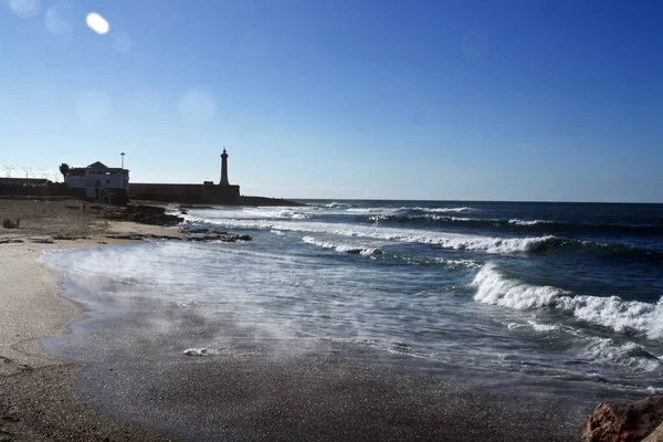 Rabat Stranden Atlanten Vacker Kustbild Med Silhuetten Rabat Fyr Bakgrunden — Stockfoto